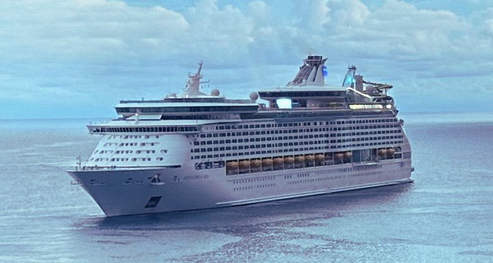 Ocean cruise ship sailing on calm open water representing ocean and river cruising.
