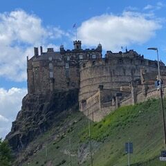 View of Edinburgh Castle from the Royal Mile in Edinburgh, Scotland.